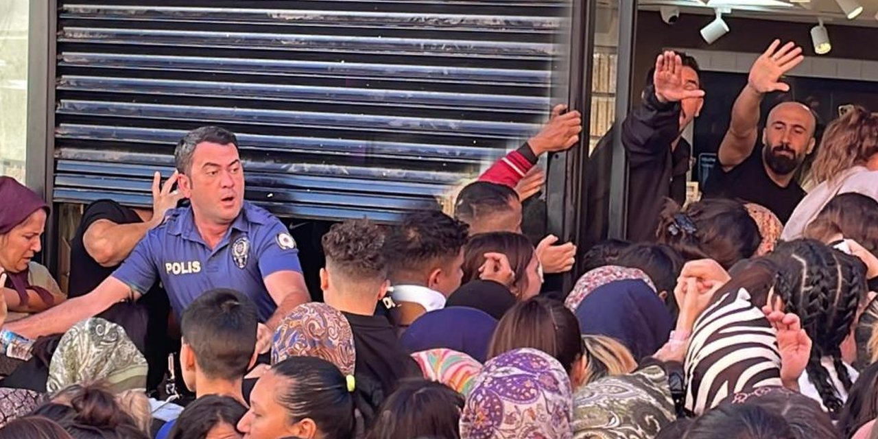 Kadınlar akın etti! Mağaza açılışında izdiham, polis ezilme tehlikesi geçirdi