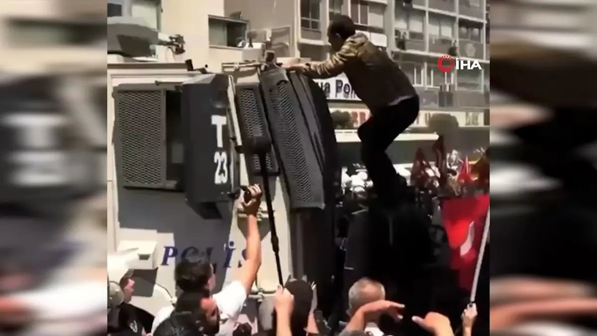 İzmir mitinginde TOMA üzerine çıkmıştı: Gözaltına alındı