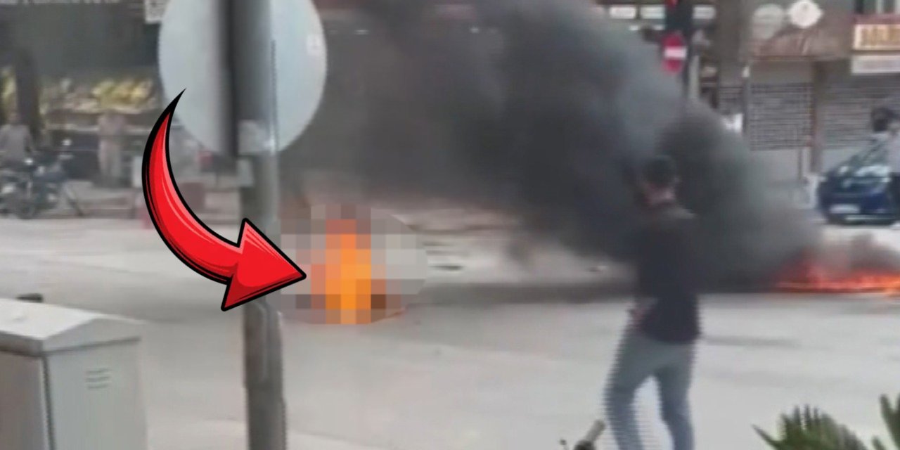 Zabıtaya öfkelenip cadde ortasında benzin döküp kendini ateşe verdi: Araçların camını sildiği için uyarmışlardı