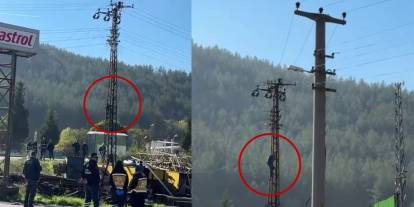 Trafik cezasına sinirlendi: Elektrik direğine tırmandı