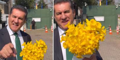 Mustafa Sarıgül aldığı sarı çiçeklerle birlikte İspanya Başkonsolosluğu'na gitti