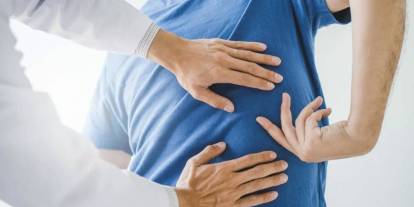 Çalışırken bel fıtığı olanlara şart aramadan maaş ve tazminat hakkı doğabilir